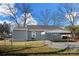 View of a backyard with a carport and a fenced-in area, offering ample space at 167 Saluda St, Chester, SC 29706