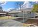 Metal carport on a gravel base, suitable for vehicle parking at 167 Saluda St, Chester, SC 29706