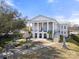This is an exterior view of the Chester County Courthouse, a white building with columns on a sunny day at 167 Saluda St, Chester, SC 29706