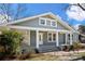 Charming home featuring a welcoming front porch and well-maintained landscaping at 167 Saluda St, Chester, SC 29706