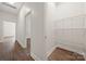 Hallway features hardwood floors and provides access to the bedrooms and living areas at 167 Saluda St, Chester, SC 29706