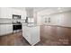 Open-concept kitchen boasting stainless steel appliances and granite countertops at 167 Saluda St, Chester, SC 29706
