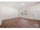 Inviting room with hardwood floors, lots of space, and plenty of natural light at 167 Saluda St, Chester, SC 29706