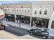 Aerial view of a streetscape with shops, overhead architectural details, with cars and pick up truck in the foreground at 167 Saluda St, Chester, SC 29706