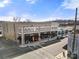 Aerial view of a streetscape with shops, overhead architectural details, with cars and crosswalk in the foreground at 167 Saluda St, Chester, SC 29706