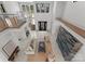 Grand living room boasts high ceilings, modern decor, and stunning views at 18601 Bluff Point Rd, Cornelius, NC 28031