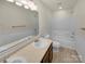 Bathroom features a double vanity, full tub, toilet, and updated fixtures at 2006 Durand Rd, Fort Mill, SC 29715