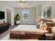 Comfortable main bedroom with soft lighting and plush bedding at 2006 Durand Rd, Fort Mill, SC 29715