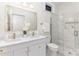 Bright modern bathroom featuring double sinks, and a beautiful glass shower at 211 W 6Th Ave, Gastonia, NC 28052