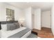 Cozy bedroom filled with natural light featuring warm hardwood floors and ample space at 211 W 6Th Ave, Gastonia, NC 28052