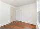 Bedroom featuring hardwood floors and a closet at 211 W 6Th Ave, Gastonia, NC 28052
