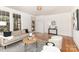 Spacious living area with hardwood floors, neutral colors, and natural light at 211 W 6Th Ave, Gastonia, NC 28052