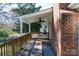 This backyard deck offers space for relaxation and outdoor dining, featuring a ceiling fan at 2129 Belle Chase Dr, Rock Hill, SC 29732