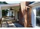 This backyard deck showcases brick detailing and a ceiling fan for comfortable outdoor living at 2129 Belle Chase Dr, Rock Hill, SC 29732