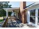 Backyard deck featuring brick chimney, ceiling fan, and views of backyard and surrounding landscape at 2129 Belle Chase Dr, Rock Hill, SC 29732