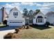 Charming single-Gathering home with a well-manicured front yard and attached two-car garage at 2129 Belle Chase Dr, Rock Hill, SC 29732