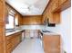 Traditional kitchen with wood cabinets and white appliances at 2129 Belle Chase Dr, Rock Hill, SC 29732