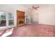 Cozy living room featuring a brick fireplace and large windows at 2129 Belle Chase Dr, Rock Hill, SC 29732