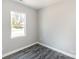 Cozy bedroom with wood floor and window view at 213 Shannonhouse W St, Shelby, NC 28152
