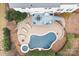 Aerial view of a landscaped backyard with a pool, patio and deck areas at 215 Whitegrove Dr, Fort Mill, SC 29715