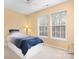Bedroom featuring a twin bed, lamp, and natural light from a window at 215 Whitegrove Dr, Fort Mill, SC 29715