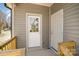 Rear entrance featuring dual doors and neutral siding at 220 Shannonhouse W St, Shelby, NC 28152