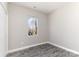 Bedroom featuring a view from a window and modern flooring at 220 Shannonhouse W St, Shelby, NC 28152