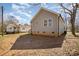 A charming exterior view of a home with a new construction visible in the background at 220 Shannonhouse W St, Shelby, NC 28152