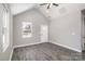 Spacious living room with vaulted ceilings and luxury vinyl plank flooring at 220 Shannonhouse W St, Shelby, NC 28152