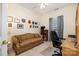 A furnished bedroom with a sofa bed, desk, bookcase, TV and neutral decor at 2713 Firethorn Ct # 48, Gastonia, NC 28056