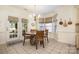 Charming breakfast nook with round table, chandelier, and natural light at 2713 Firethorn Ct # 48, Gastonia, NC 28056