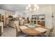 Bright dining area open to the kitchen, featuring a stylish chandelier and comfortable seating at 2713 Firethorn Ct # 48, Gastonia, NC 28056