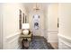 Elegant entryway with hardwood floors, decorative mirror accents, and stylish pendant lighting at 2713 Firethorn Ct # 48, Gastonia, NC 28056