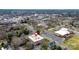 Aerial view of the apartments with the city skyline and the parking lot in the background at 300 N Fulton St # 12, Salisbury, NC 28144