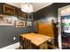 Dining area with dark walls, vintage furniture, and artwork at 300 N Fulton St # 12, Salisbury, NC 28144