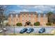 Brick apartment building with a parking lot and a covered entry at 300 N Fulton St # 12, Salisbury, NC 28144