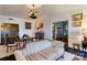 Inviting living room featuring a striped sofa, stylish decor, a vintage chandelier and views to dining area at 300 N Fulton St # 12, Salisbury, NC 28144