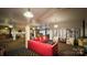 Retro recreational room including living space, pool table, ping pong table, and multiple seating areas at 300 N Fulton St # 12, Salisbury, NC 28144