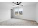Bright bedroom with carpet, two windows and neutral decor at 3030 Swallowtail Ln, Kannapolis, NC 28083