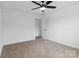 Carpeted bedroom with neutral walls, ceiling fan and open doorway at 3030 Swallowtail Ln, Kannapolis, NC 28083