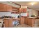 Charming kitchen features wooden cabinetry and an efficient layout at 355 Branchwood Rd, Statesville, NC 28625