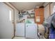 Practical laundry area with washer, dryer and storage options to maximize organization at 355 Branchwood Rd, Statesville, NC 28625