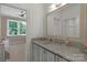 Bathroom with granite countertop vanity, and neutral color palette at 4009 Beechwood Spring Ln, Belmont, NC 28012
