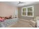 Cozy bedroom with a daybed, plush stuffed animals, and a sunny window for a warm and inviting atmosphere at 4009 Beechwood Spring Ln, Belmont, NC 28012