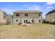 Backyard with patio, fire pit, and grill, ideal for outdoor gatherings and relaxation at 4035 W Sandy Trl, Fort Mill, SC 29707