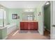 Bathroom boasts a double vanity, soaking tub, and separate toilet room at 4035 W Sandy Trl, Fort Mill, SC 29707