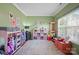 Bright and airy bedroom with colorful decor, ample natural light, and a playful rug at 4035 W Sandy Trl, Fort Mill, SC 29707