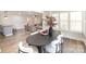 Elegant dining room featuring a modern table with seating for six and shutters at 4136 Woodgreen Ter, Charlotte, NC 28205