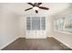 Spacious living room features hardwood floors, built-in shelving, and natural light at 4136 Woodgreen Ter, Charlotte, NC 28205