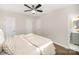 Bright main bedroom shows ensuite bathroom and neutral decor at 4136 Woodgreen Ter, Charlotte, NC 28205